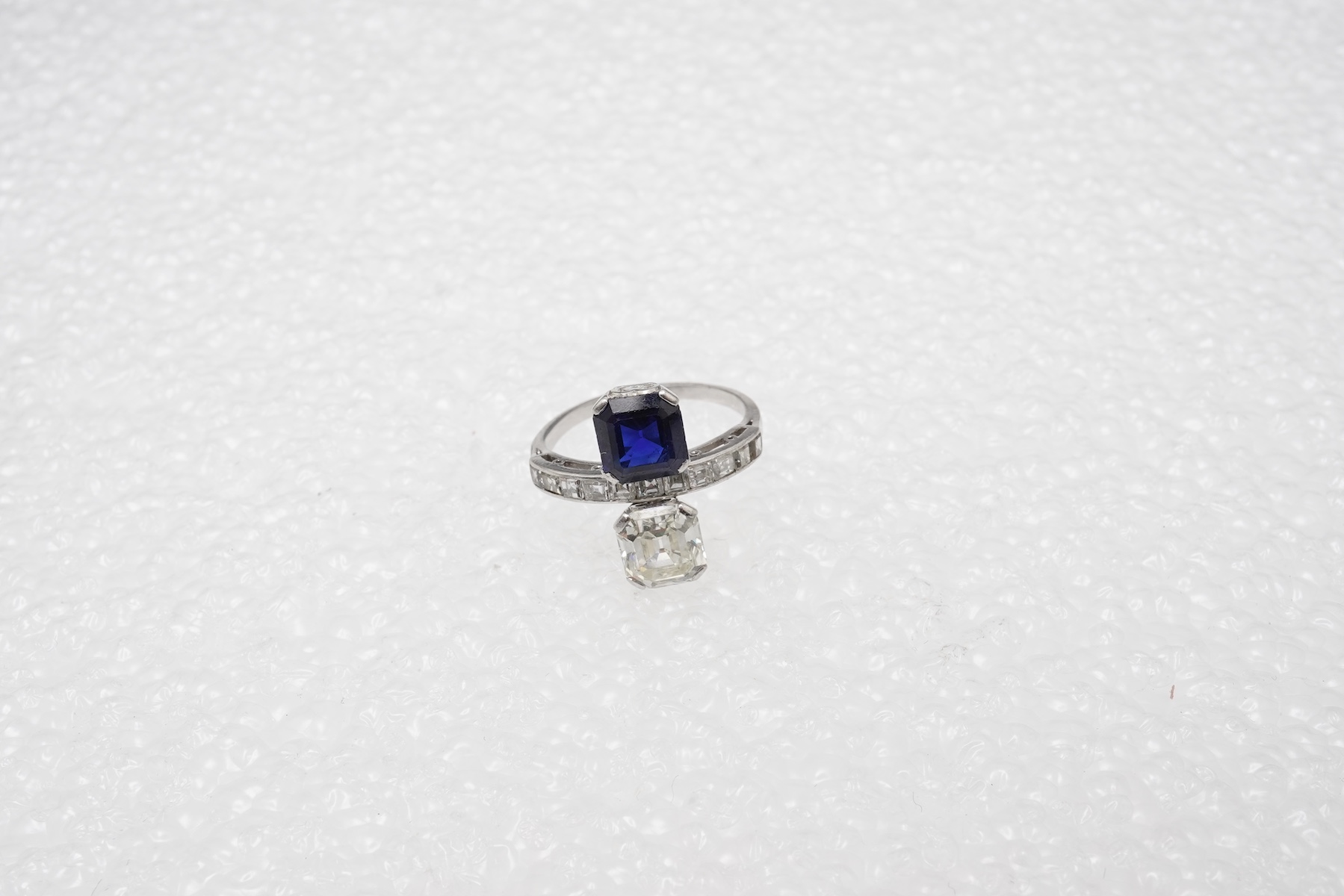 An Art Deco sapphire and diamond 'toi-et-moi' ring, 1930s